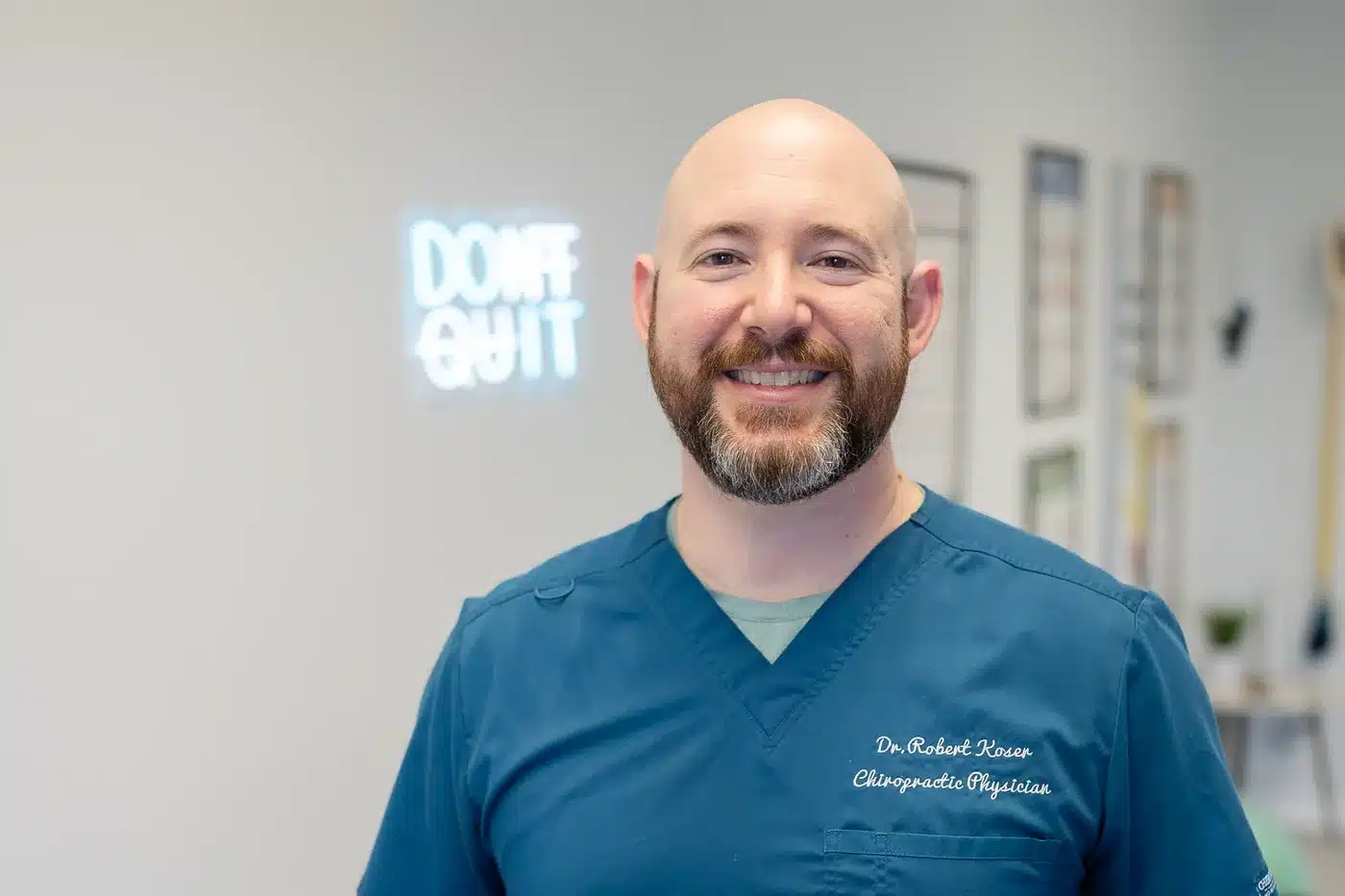 Dr. Bobby Koser, DC, chiropractic physician, in the treatment hallway at HealthSpine Chiropractic in Carrollwood, Tampa.